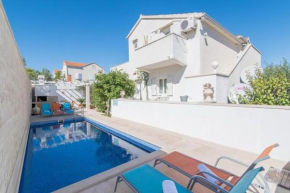 Family friendly apartments with a swimming pool Supetar, Brac - 16774